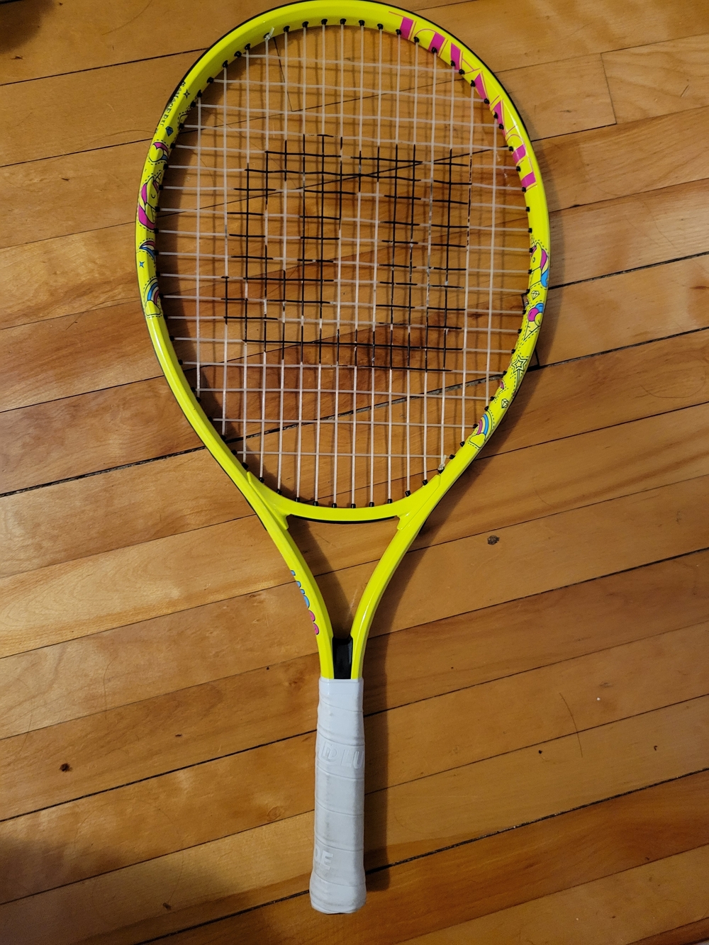 Neon Yellow Tennis Racket with Pink Accents